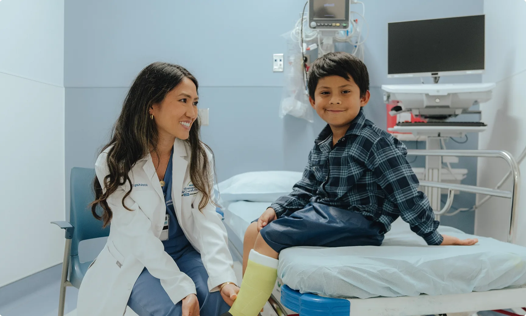 DR Kang with patient in Urgent Care